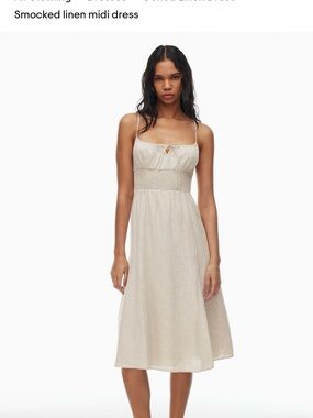 ARITZIA Genoa Linen Dress
Smocked linen midi dress SIZE L